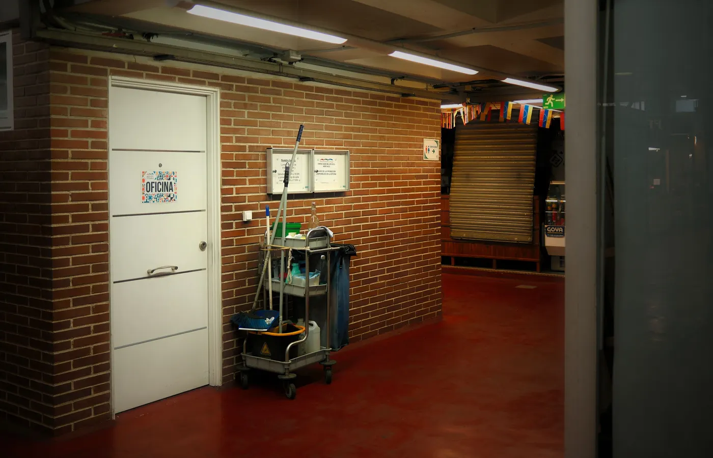 Office cleaning cart and supplies staged in a commercial office hallway in Buena Park, CA